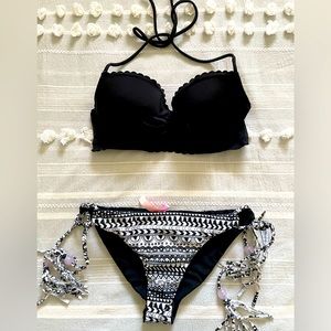 Very cute swimsuit by Victoria Secret. It’s two different tops and one bottom